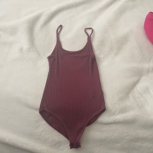 maroon body suit